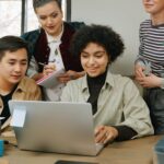 Group of people using Study Builder on a laptop