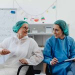 Two medical professionals with different roles in a lab