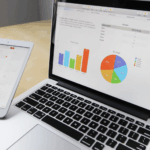 Laptop showing reports for clinical monitoring