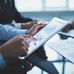 Businessman analyzing EDC report
