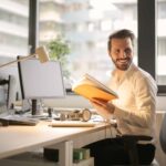 Man sitting at desk conducting UAT